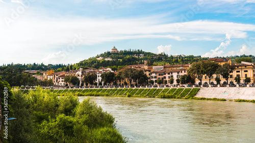 View over Adige river on church Sanctuary of the Madonna of Lourdes, Santuario della Madonna di Lourdes. Verona, Italy 