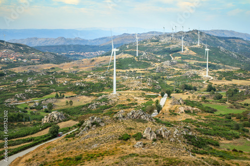 Serra do Caramulo wind farm, in Portugal, seen from the top of Caramulinho, at sunset. photo