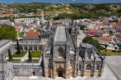 Batalha, Portugal - June, 29, 2020: Aerial Drone View of Batalha Monastery. Dominican convent with manueline style architecture. photo