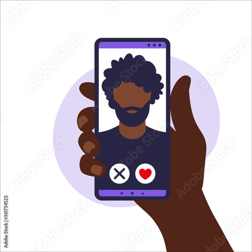 Dating app. Mobile dating app for finding new friends, hook-ups and romantic partners. Illustration of human hand holding smartphone with foto african man. Vector illustration in flat.