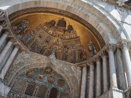 Venice, Italy - July 2020 Saint Marcus Square, the cathedral, tower and Doge s Palace durig summer time. photo