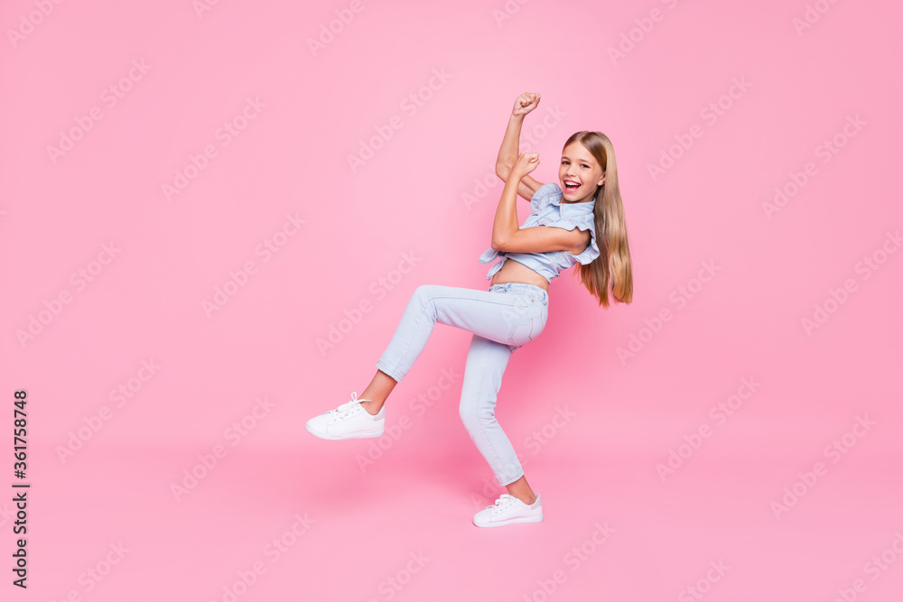 Full length body size view of her she nice attractive lovely pretty successful glad cheerful cheery preteen girl rejoicing having fun dancing isolated over pink pastel color background