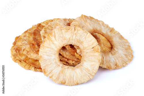 Dried pineapple slices isolated on white background