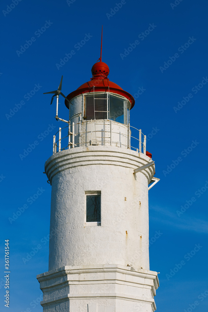 Egersheld Lighthouse against blue sky in Vladivostok, Russia