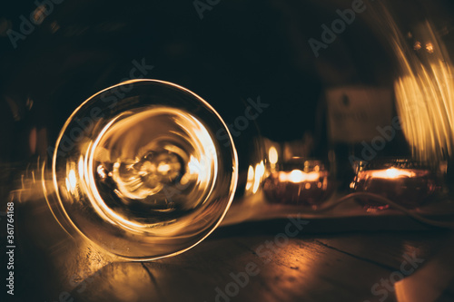abstract blurry circle light on dark wooden table