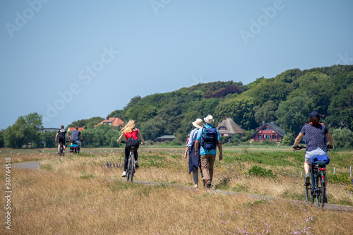 06-25-2020 Insel Hiddensee, Germany, Vitte, View to the Village "Kloster" with walking tourists