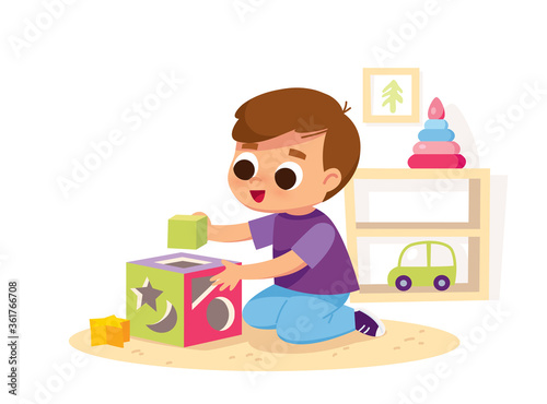 Boy play educational toys. Child playing designer cubes, developmental constructor.
