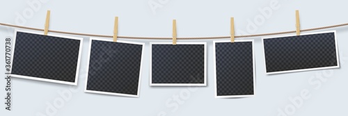 Photos hanging on rope attached with clothes pins. Blank instant photo frames with transparent place isolated on white background. Wooden clothes pegs with photography vector illustration photo