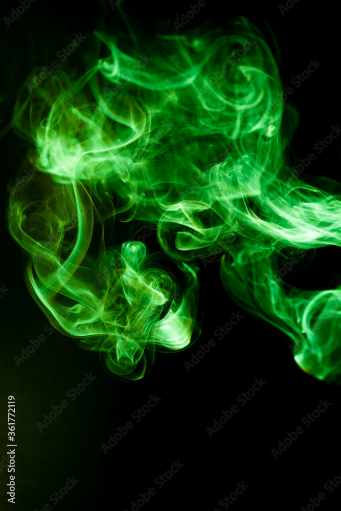 Green smoke motion on black background. Green smoke motion on black background.