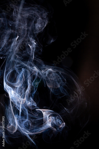 Smoke motion on black background.