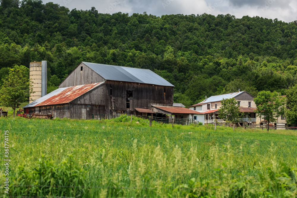 Amish farm with an unpainted barn