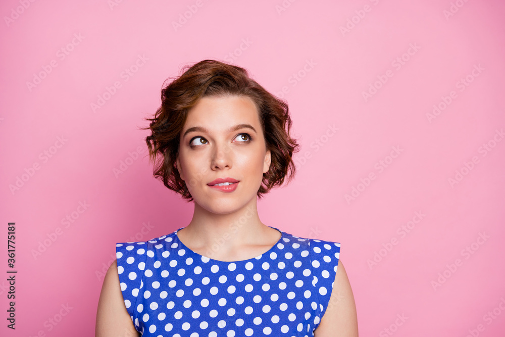 Close-up portrait of her she nice attractive lovely pretty charming brown-haired girl thinking biting lip looking aside creating new strategy isolated over pink pastel color background Close-up portrait of her she nice attractive lovely pretty charming brown-haired girl thinking biting lip looking aside creating new strategy isolated over pink pastel color background