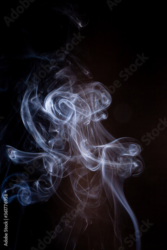 Smoke motion on black background.
