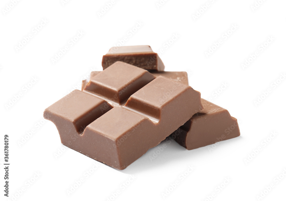 Pieces of delicious milk chocolate isolated on white Pieces of delicious milk chocolate isolated on white