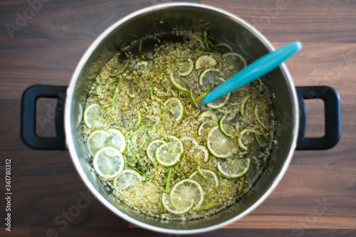 Quadro em tela Elderflower cordial steeping in a metal pot