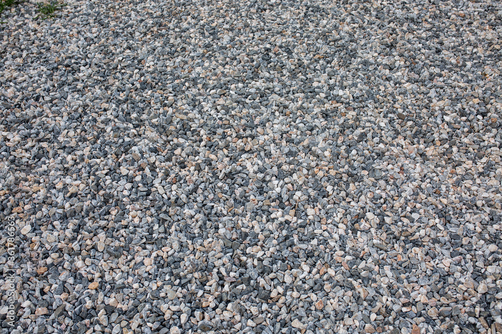 Crushed rock surface cover the ground, material for concrete construction. Texture background. Crushed rock surface cover the ground, material for concrete construction. Texture background.