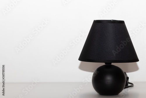 Little black night lamp on a white background