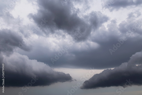 Epic Dramatic Storm sky, dark grey clouds background texture, thunderstorm 