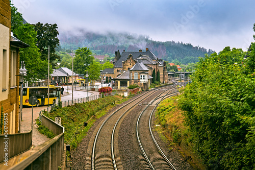 Bild auf Leinwand Railway station of Goslar against scenic foggy mountains, Lower Saxony, Germany