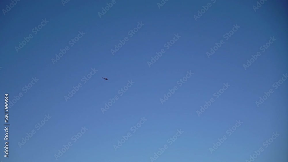 Helicopter flying and landing at airport airfield Helicopter flying and landing at airport airfield