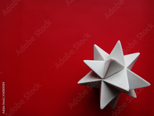 red background with decorative star
