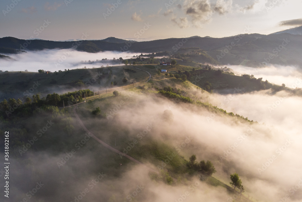 Aerial foggy landscape in Transylvania, at sunrise Aerial foggy landscape in Transylvania, at sunrise