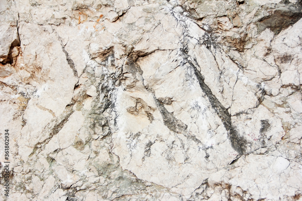texture of natural grey stone with a cracks