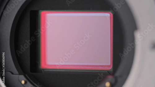 Open mirrorless digital Camera shows shutter mechanism close up view photo