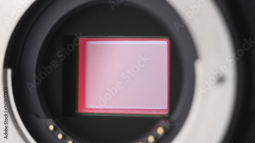 Open mirrorless digital Camera shows shutter mechanism close up view photo