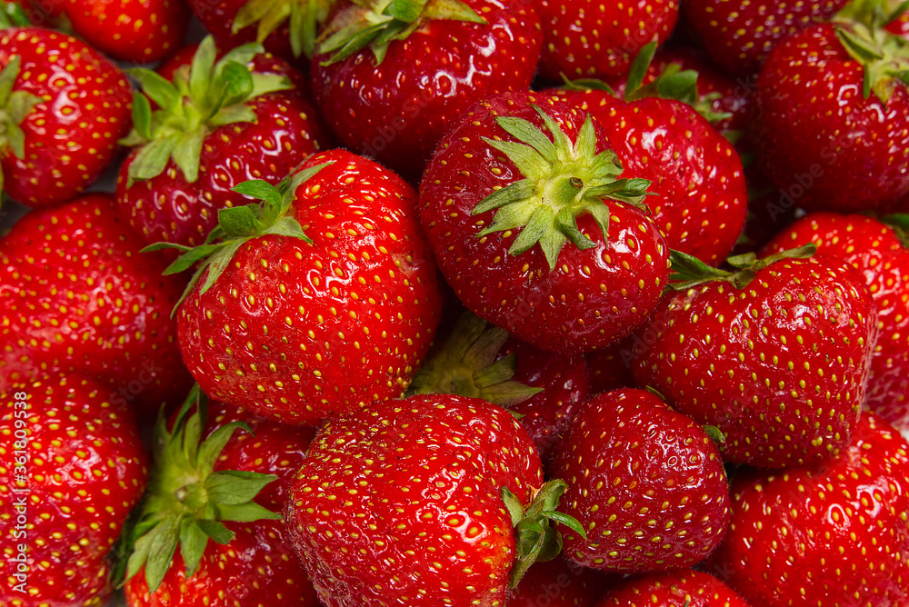 Fresh ripe organic strawberry. Mashed ripe strawberries background. Top view, Fresh ripe organic strawberry. Mashed ripe strawberries background. Top view,