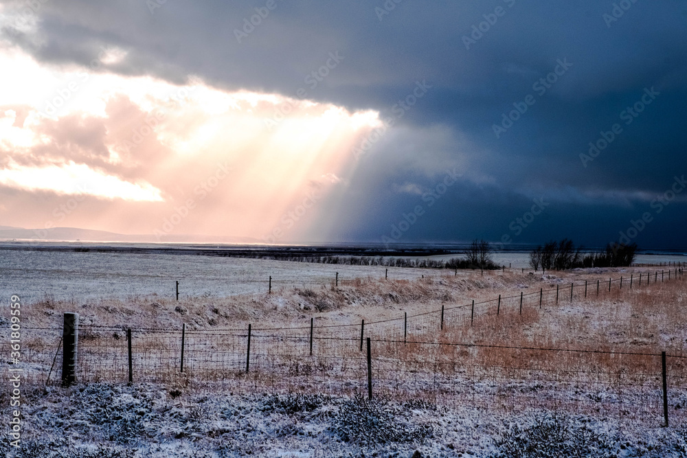 Landscape south of Iceland on highway number 1 towards Vik with an approaching storm Landscape south of Iceland on highway number 1 towards Vik with an approaching storm