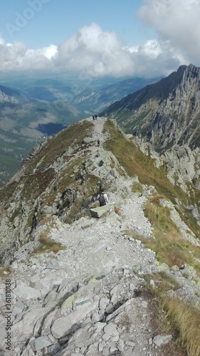 A mountain trail going through a peak