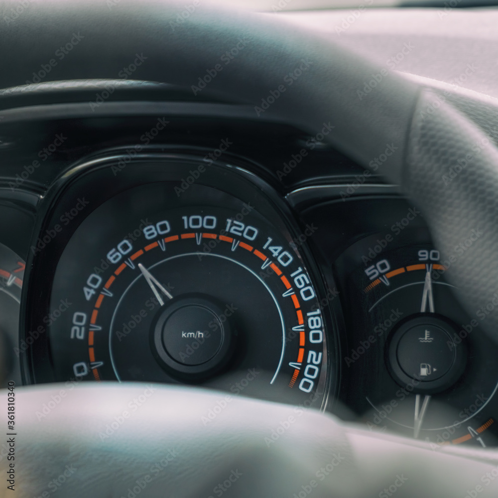 Naklejka premium Dashboard and speedometer in the car. Selective focus