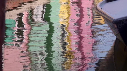 Wallpaper Mural Beautiful and colorful buildings are reflected on the water in one of the many canal that cross Burano. Italy Torontodigital.ca