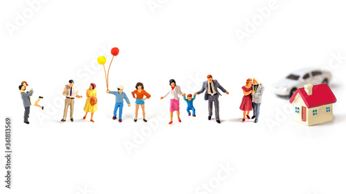 miniature people on white background.