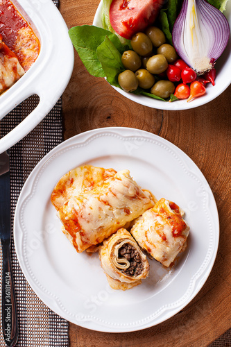 Wallpaper Mural .Pancakes with meat, in tomato sauce and cheese. View from the top. Torontodigital.ca