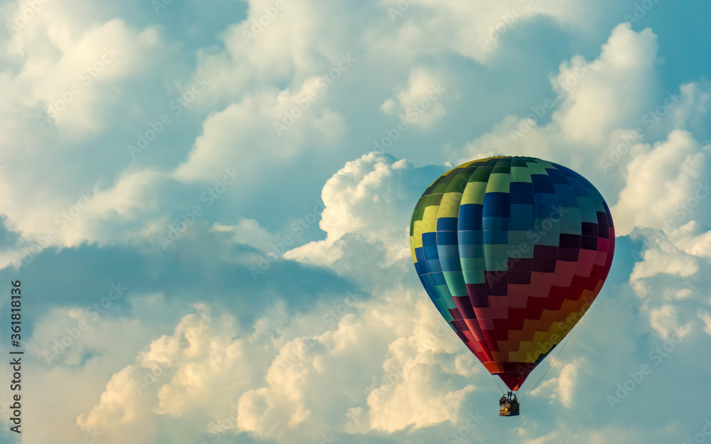 Fototapeta premium Hot air balloon over the clouds
