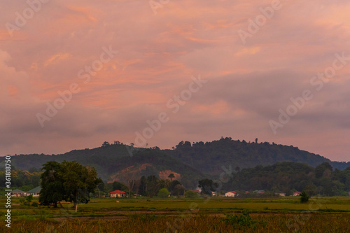 unusually beautiful fiery red tropical sunset in the mountains.