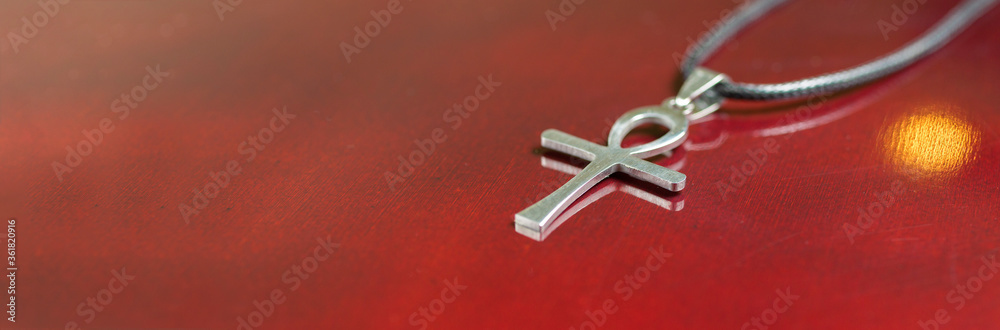 Egyptian amulet ankh on a blue background, .Egyptian cross Egyptian amulet ankh on a blue background, .Egyptian cross