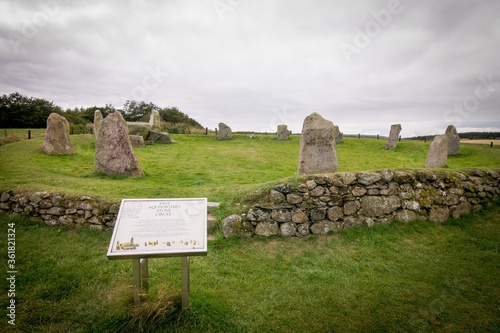 Beautiful view of the East Aquhorthies Stone Circle captured on a cloudy day in Inverurie, UK photo