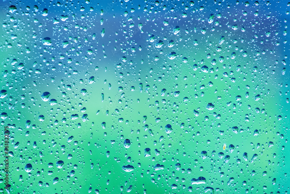 Drops of water on the glass during the rain Drops of water on the glass during the rain