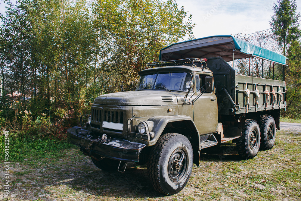 Soviet truck in the Carpathian Mountains carries people on excursions.