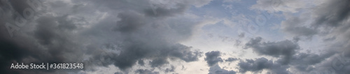 Panorama of dark gray stormy sky, gray clouds cover the sky © Volodymyr
