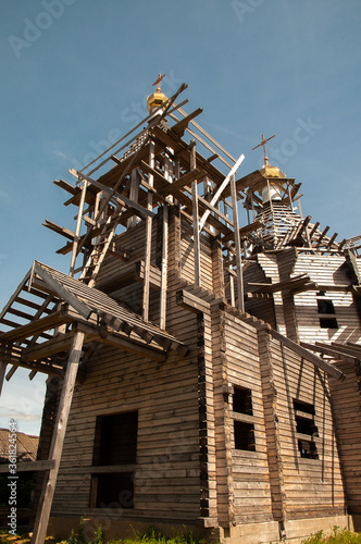 unfinished wooden Church on a Sunny clear summer day