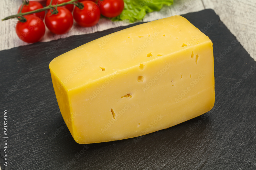 Hard yellow tasty cheese brick Hard yellow tasty cheese brick