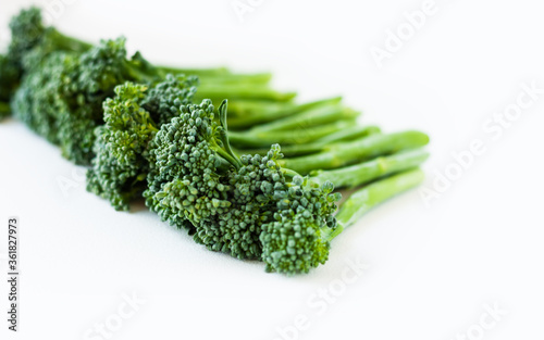 Fresh broccolini isolated on white background with copy space.