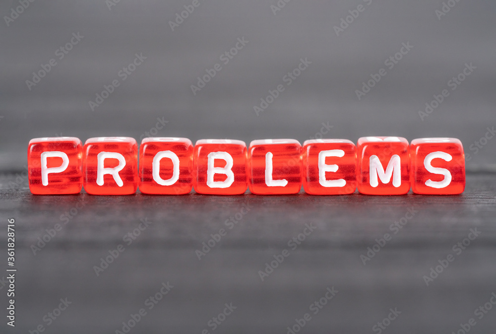 Problems word on red cubes. Business concept