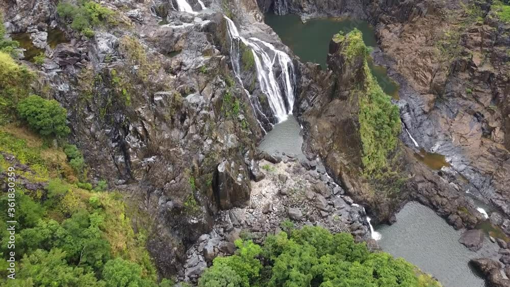 The majestic rocky mountain Barron Falls in Australia - aerial The majestic rocky mountain Barron Falls in Australia - aerial