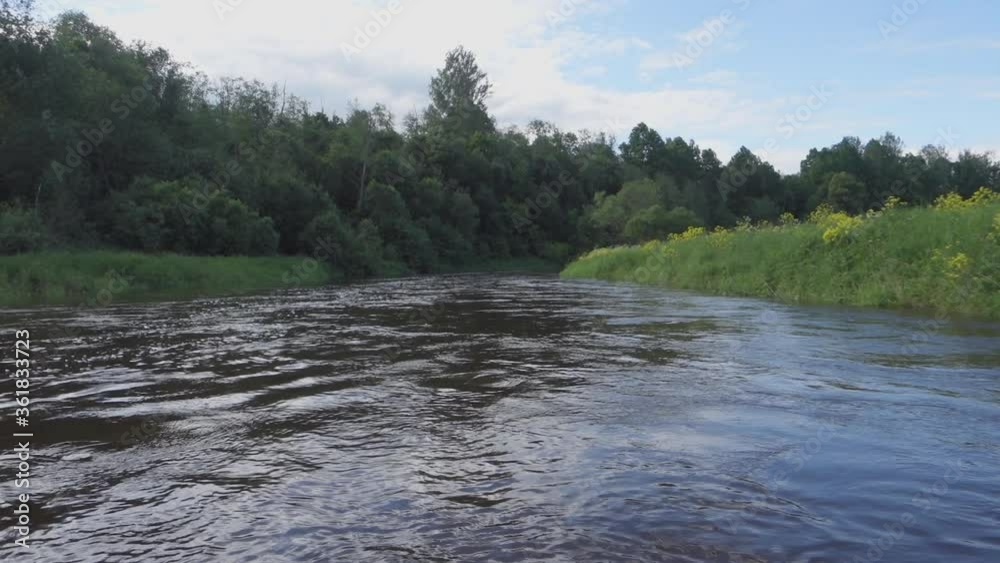 River rafting in summer. Packrafting in wilderness. Derzha River, Tver Region, Russia. River rafting in summer. Packrafting in wilderness. Derzha River, Tver Region, Russia.