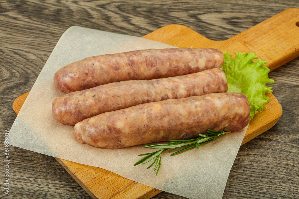 Raw pork meat sausages for grill Raw pork meat sausages for grill